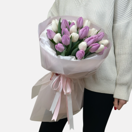 Bouquet of white and violet tulips