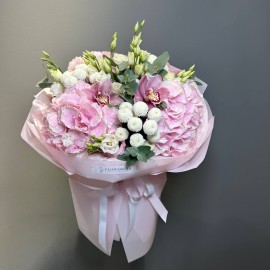 Bouquet of pink hydrangeas, eustomas, and orchids